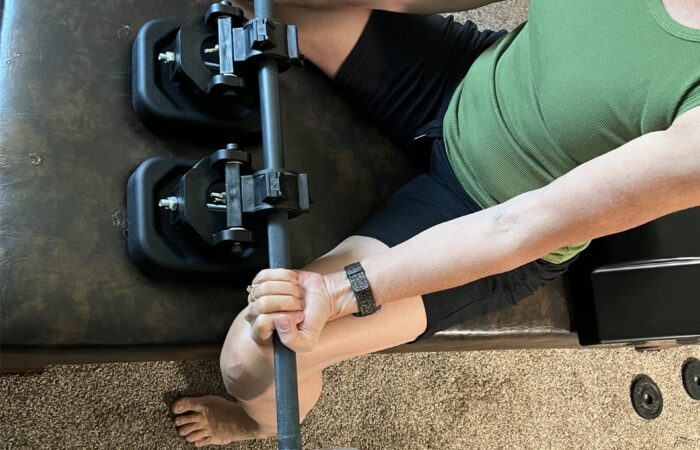 Supported table exercise for chronic pain relief
