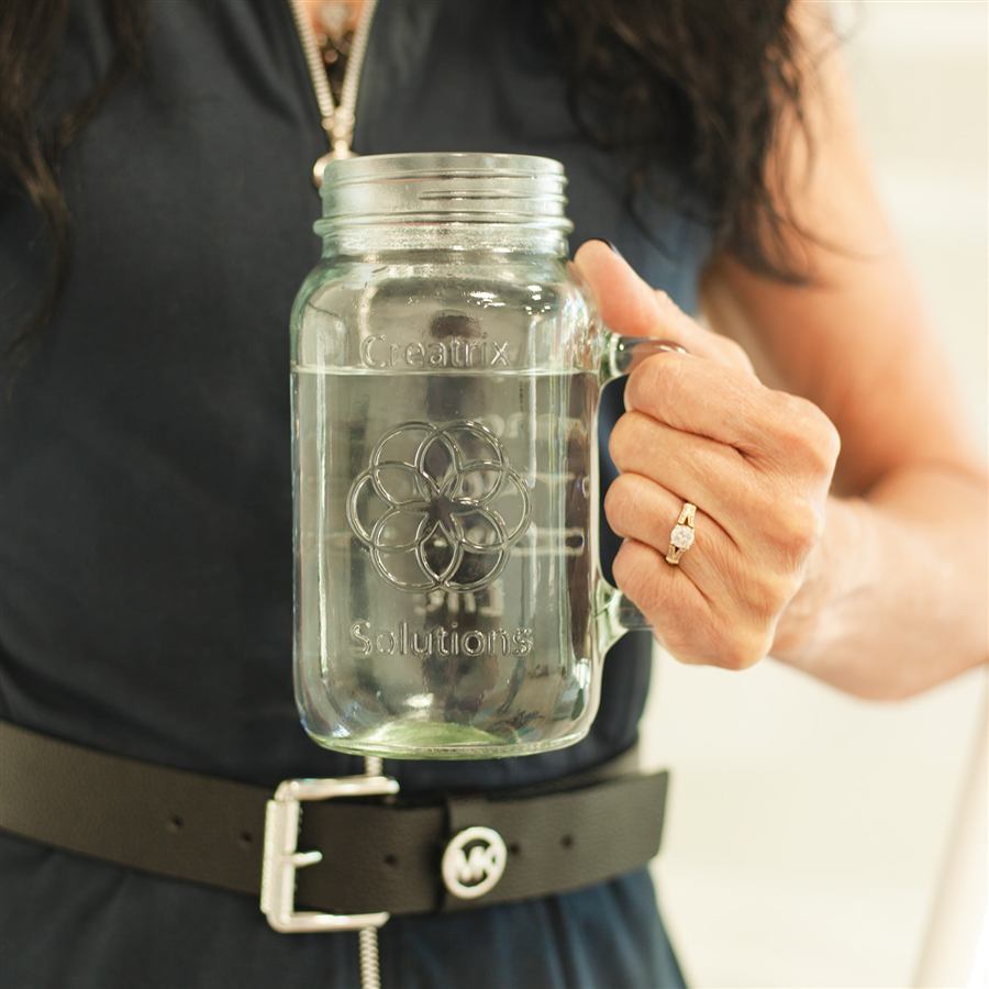 Creatrix Solutions hydration mason jar with mineral-rich water