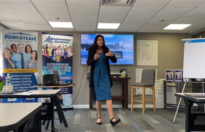 Eileen Durfee presenting invention commercialization at a business summit