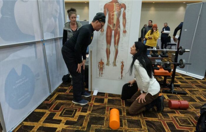Eileen Durfee teaching spinal anatomy to students