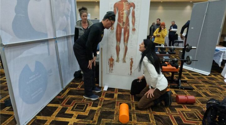 Eileen Durfee teaching spinal anatomy to students