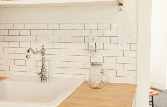 Bright healthy kitchen with glass jar on counter