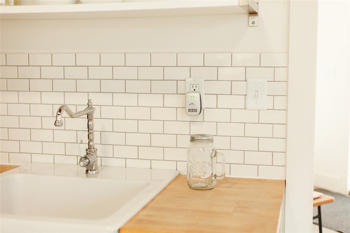 Bright healthy kitchen with glass jar on counter