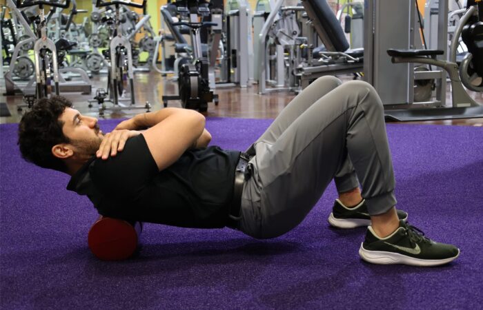 Foam roll mobility work in the gym for staying strong after 50