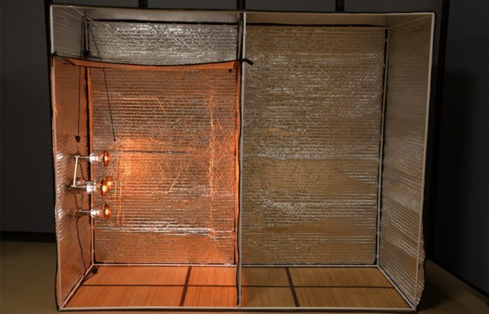 Near infrared lamps glowing inside the Sauna Fix radiant tent