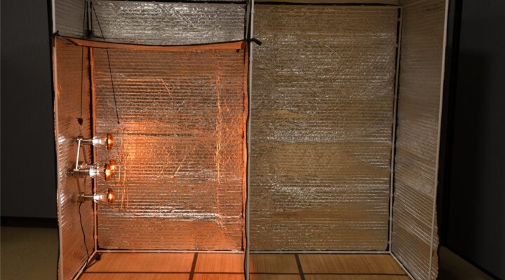 Near infrared lamps glowing inside the Sauna Fix radiant tent