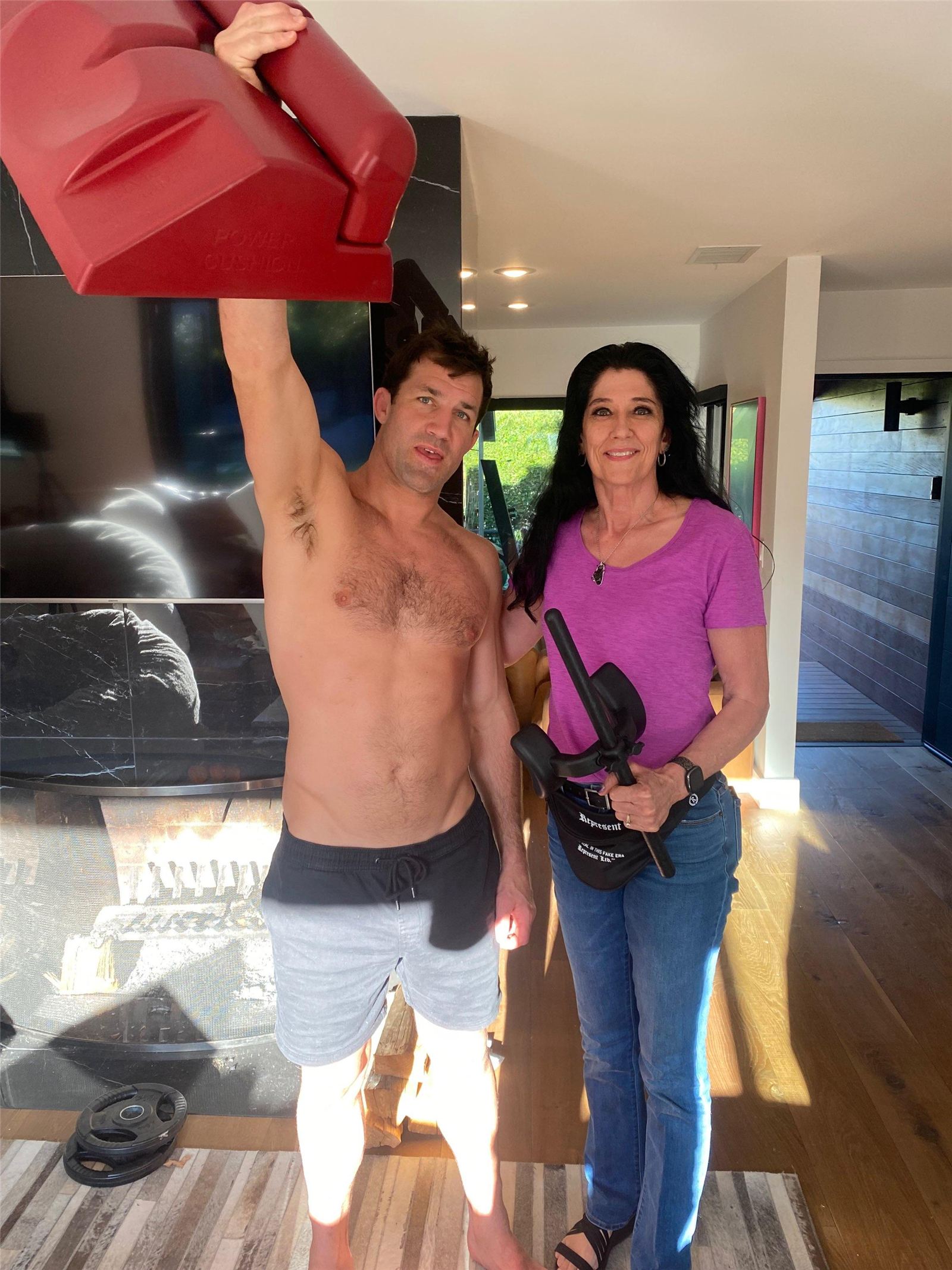 Eileen Durfee training an athlete on spinal fitness fundamentals in the gym