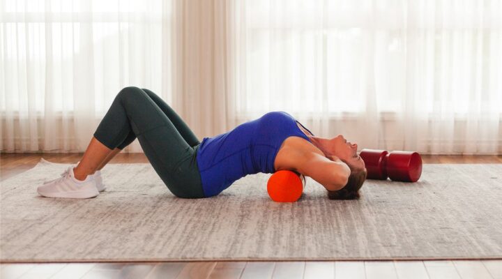 Spinal extension exercise over a firm foam roll