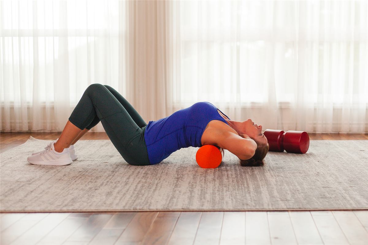 Spinal extension exercise over a firm foam roll