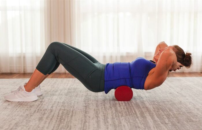 Spinal alignment exercise using a Creatrix foam roll