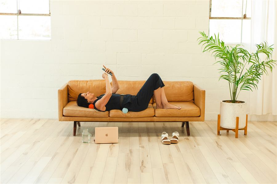 Supported rest over Neck and Back Shaper rolls as a recovery routine