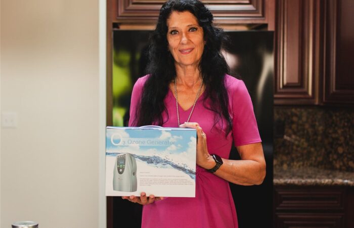 Eileen Durfee preparing ozonated water with the Tri-Oxy ozonator