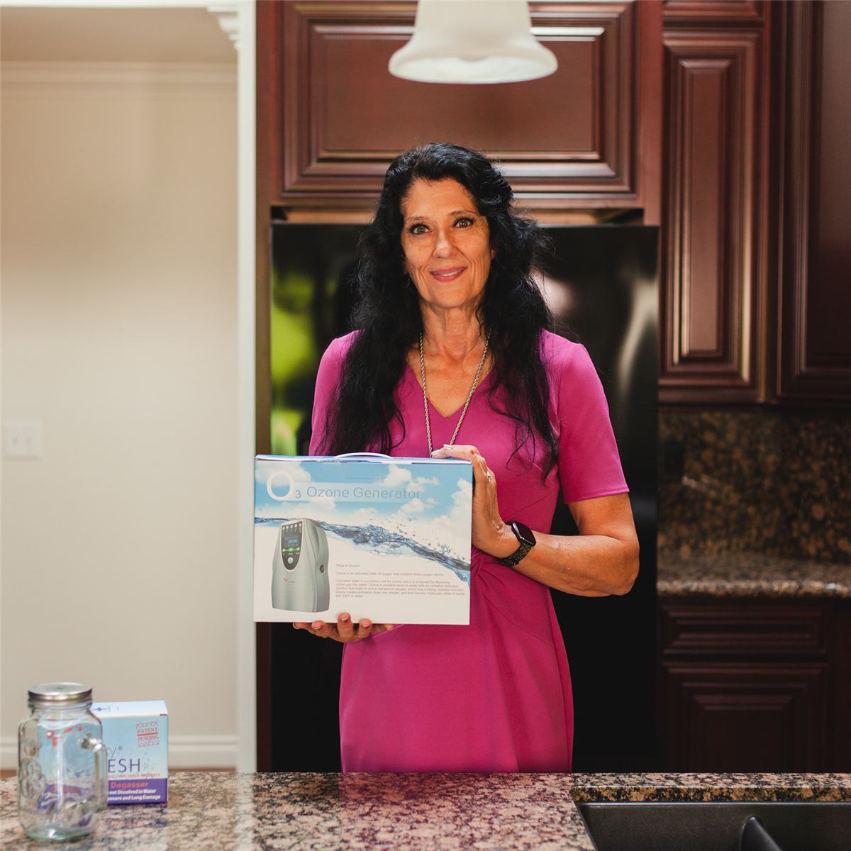 Eileen Durfee preparing ozonated water with the Tri-Oxy ozonator