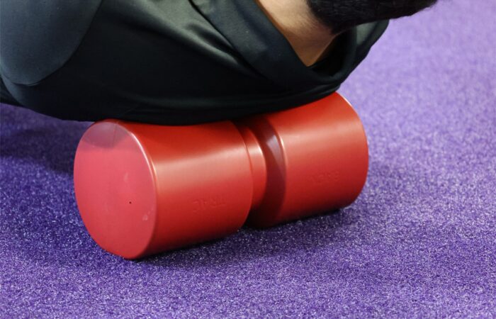 A woman exercising with Eileen Durfee's patented PowerCushion invention
