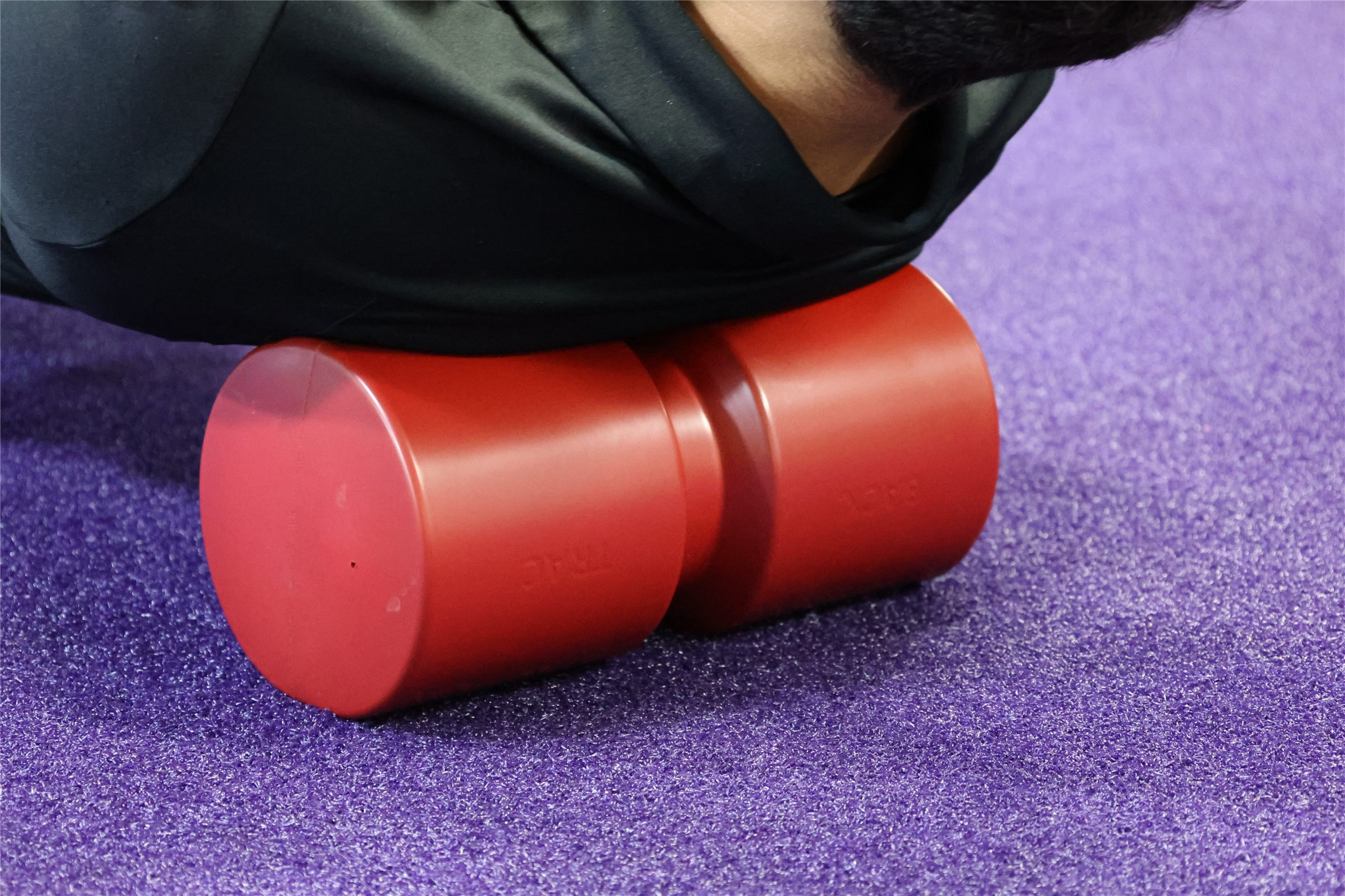 A woman exercising with Eileen Durfee's patented PowerCushion invention